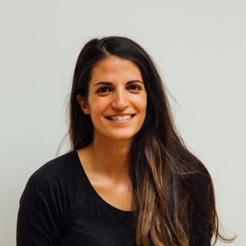 woman wearing black scoop-neck long-sleeved shirt